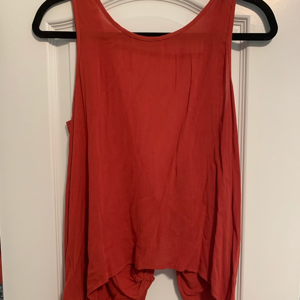 Red top with twist back.